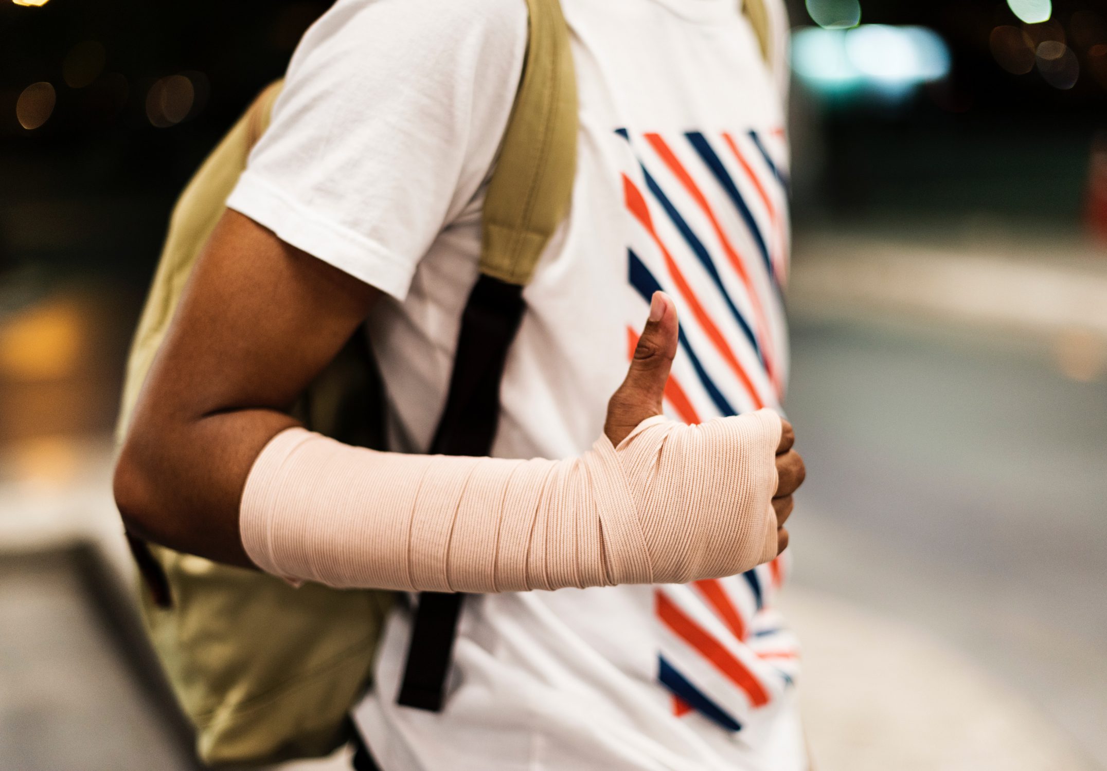 Man with wrapped arm